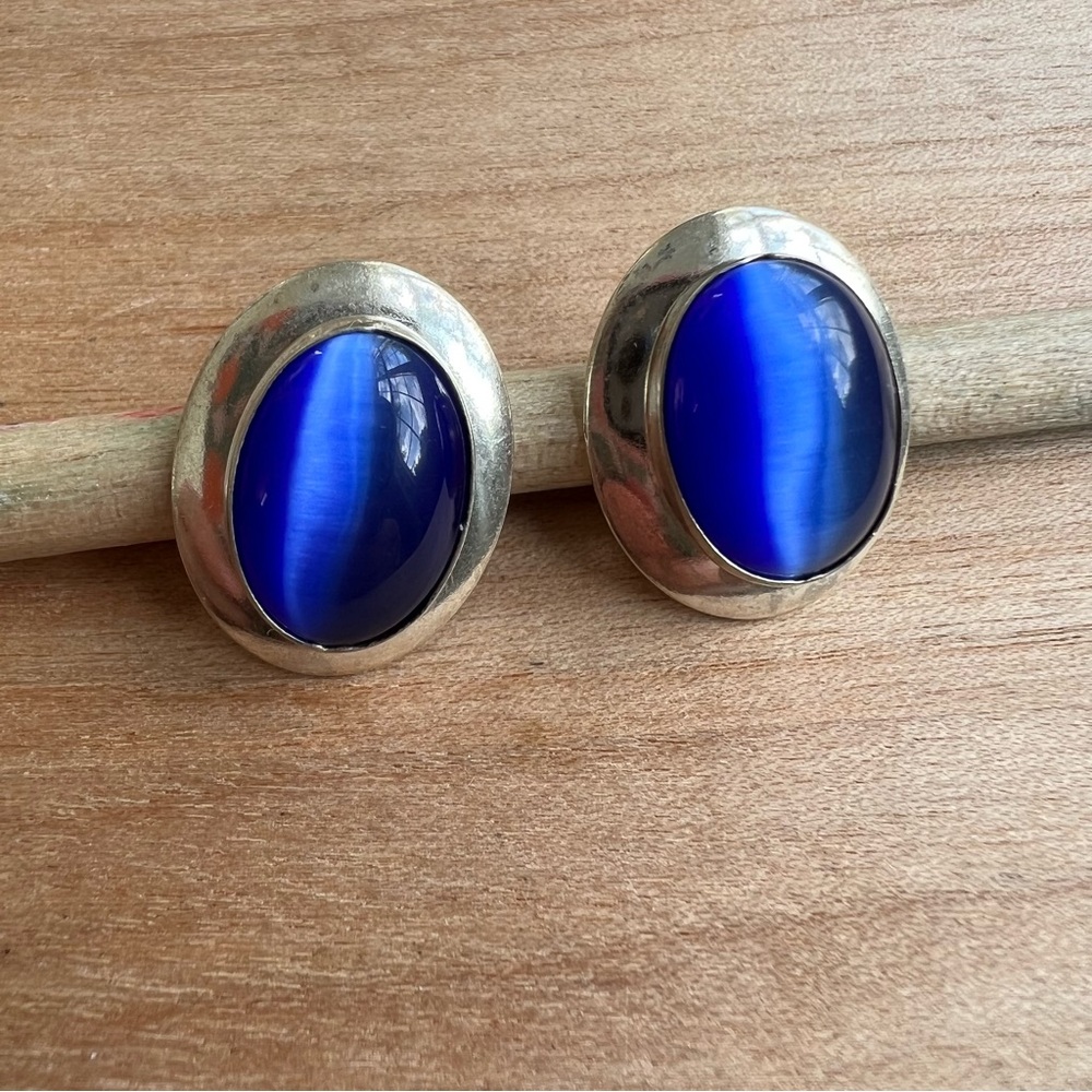 Vintage Sterling silver earrings with blue cats eye center on posts
